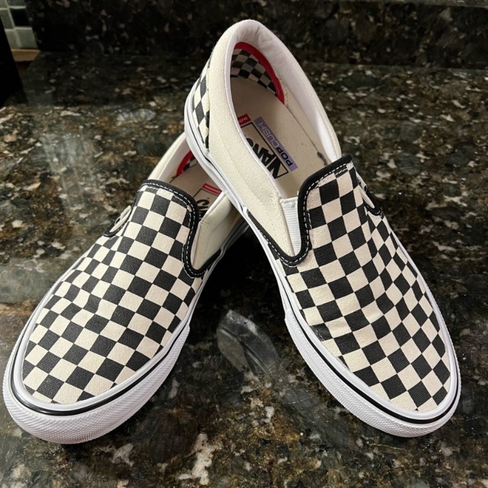 Vans Classic black and white checkered slip ons